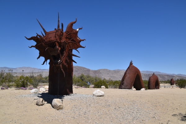 Giant metal sea dragon sculpture crosses the road at Anza-Borrego Desert State Park